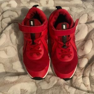 Red running nike shoes used